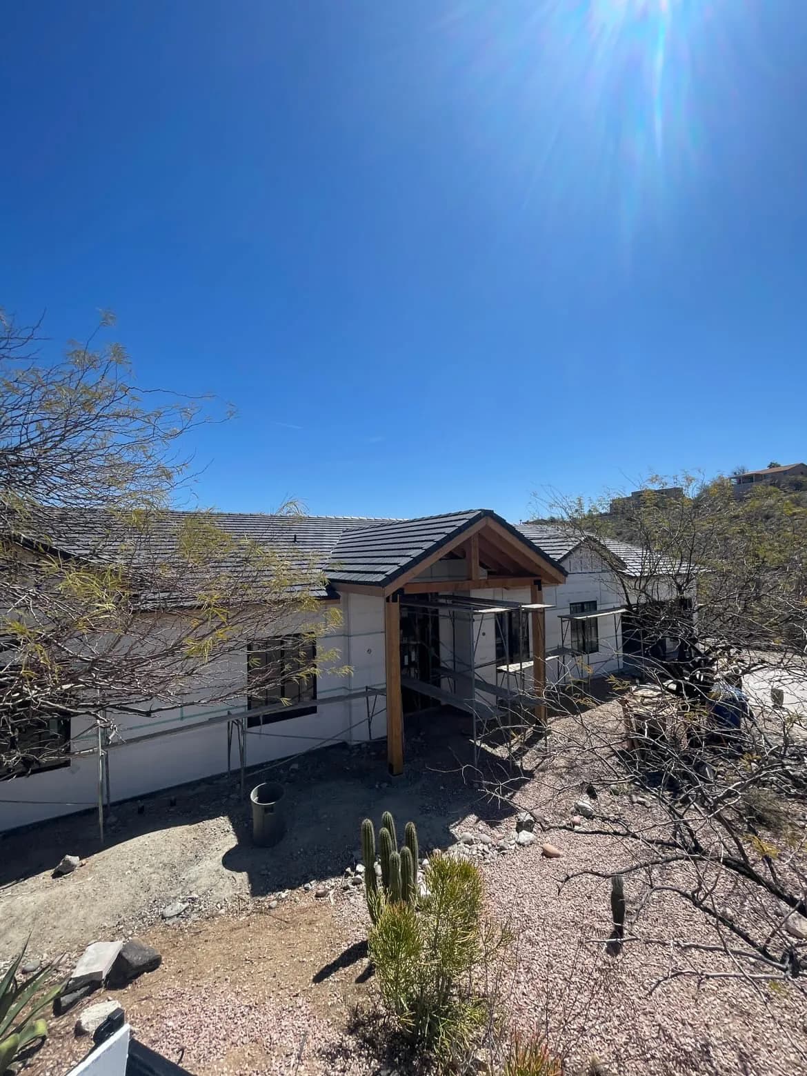 Arizona hillside home with a new roof going on during a Masizo job